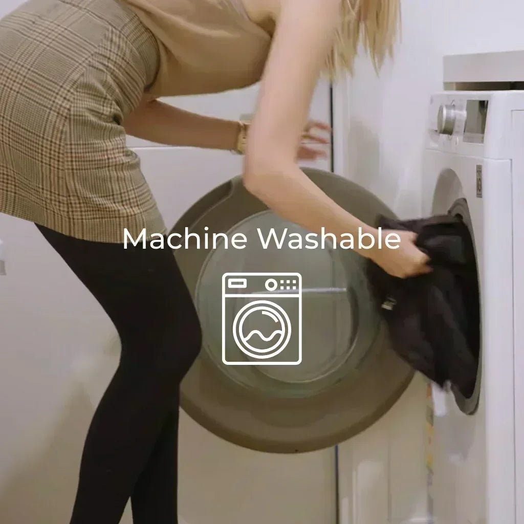 Person loading a garment into a washing machine with 'Machine Washable' text and icon.