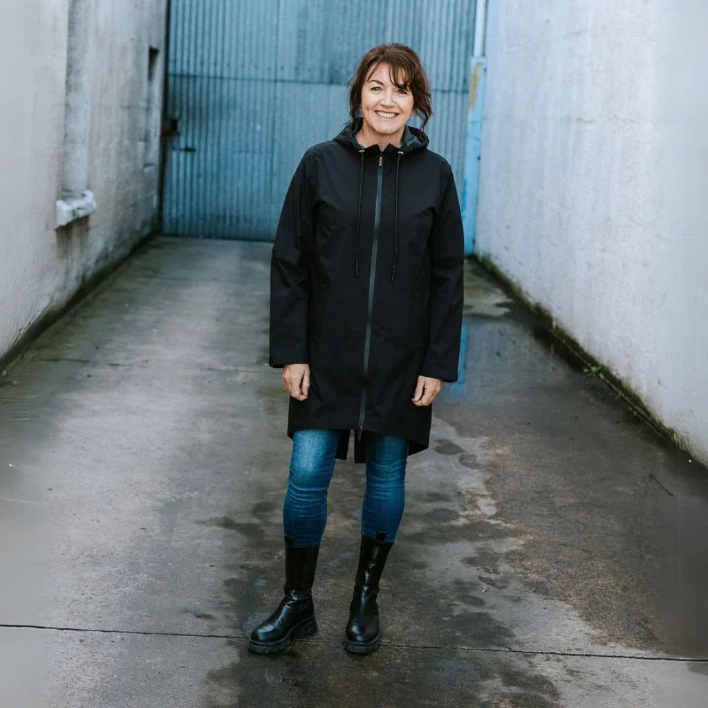 Moke black women's waterproof hooded rain jacket with zipper closure.