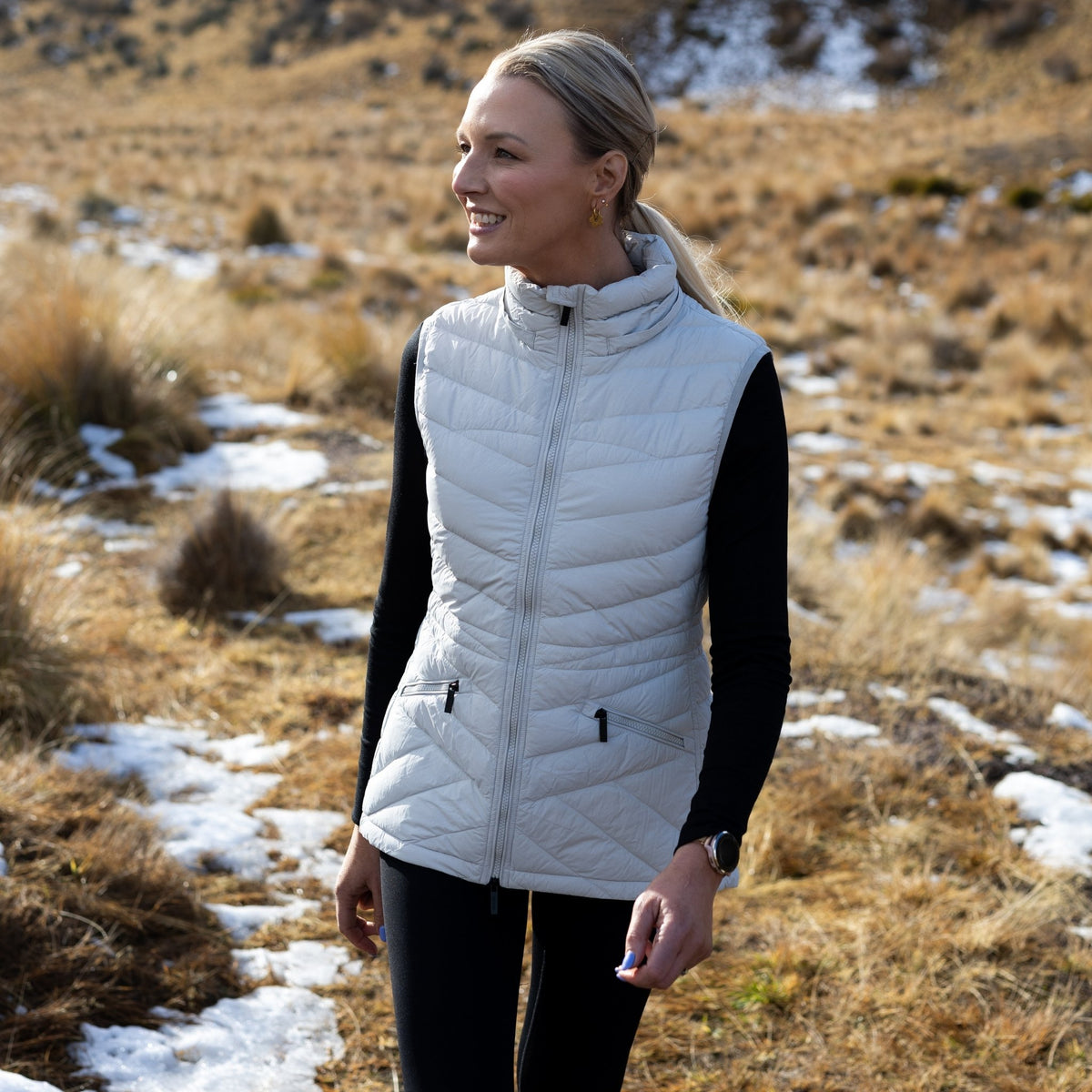 Mary-Claire packable down vest front view styled outdoors